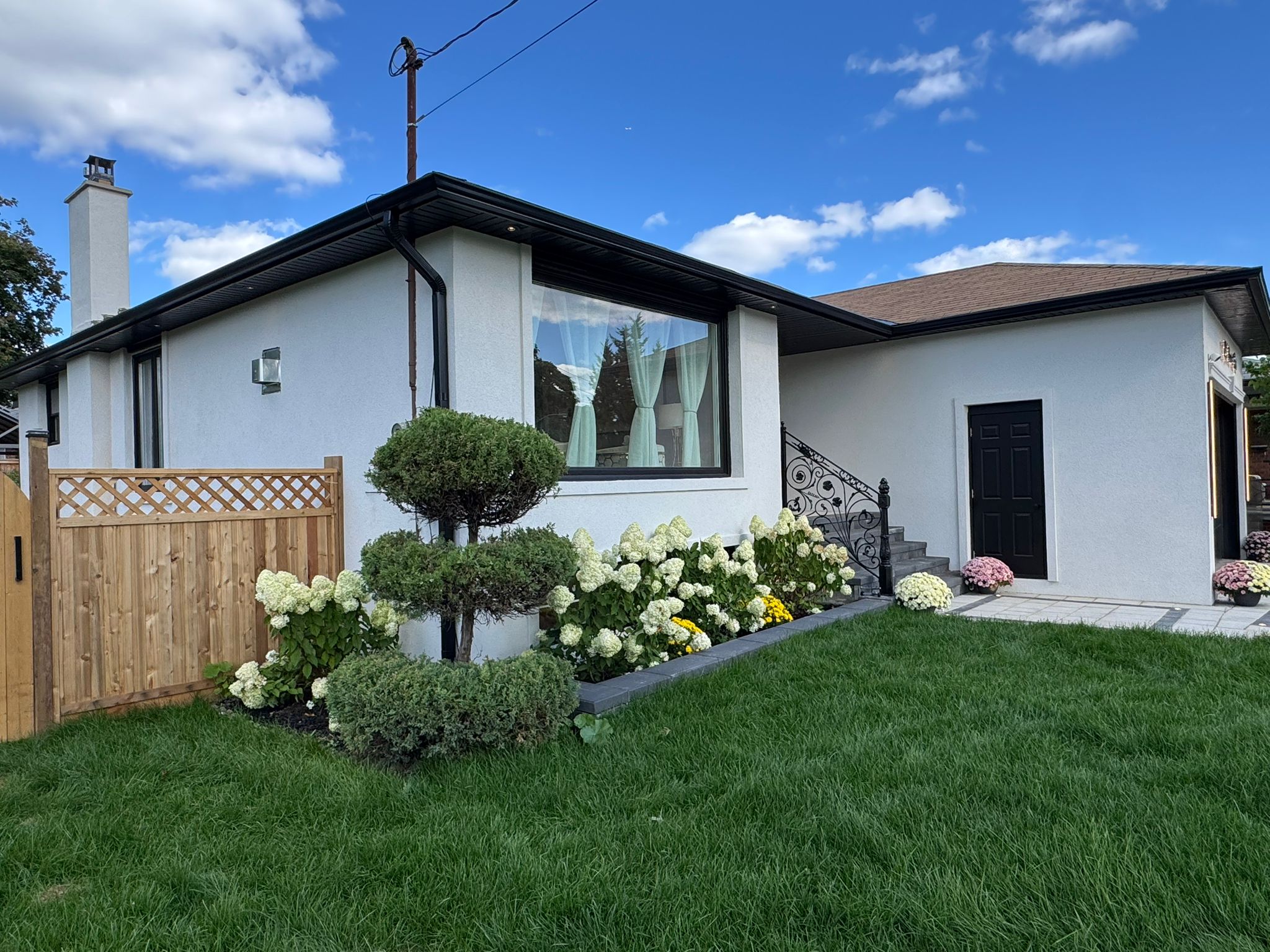 Stucco and stone exterior project completed in Ontario